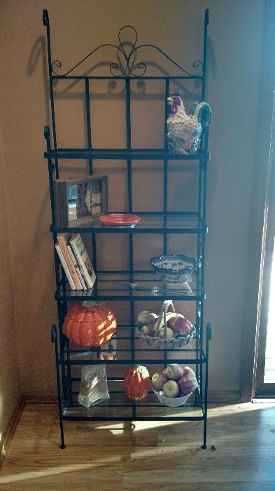 Bakers rack, pumpkin decor, cookbooks, fruit bowls from Italy, candles