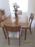 Mid century modern table and chairs with leaves and pads