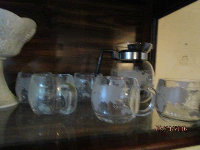 COFFEE POT WITH 4 CUPS AND CREAMER.  WORLD PATTERN SHADED ON EACH PIECE.