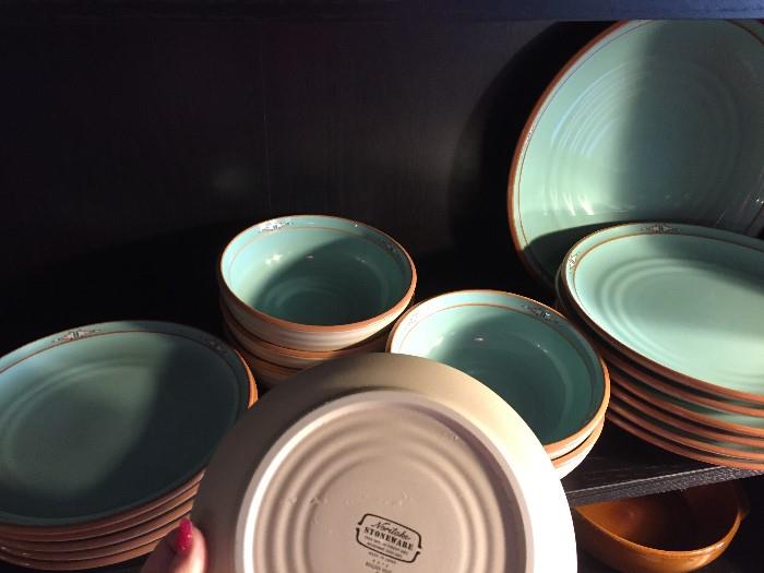 Photo does not do this justice  Its a nice turquoise southwest stoneware. 