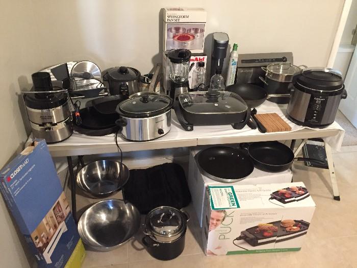  Wolf Gang Puck, Pro Food Slicer, Food Saver, Soda Stream, Hamilton Beach Blender, Cuisinart Electric Pressure Cooker, Kitchen Aid, Jack LaLanne Power Juicer, Large Stainless Bowls, Crock Pots, Elec. Skillets, and much more. 