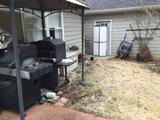 Grills, smoker, outdoor rubber storage cabinet, wheel barrow, etc.