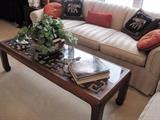 Down filled sofa and matching love-seat. Custom made Rosewood coffee table. 
