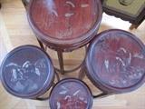 Rosewood nesting tables with inlaid decorations in sterling silver.