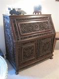 Elaborately carved and detailed desk. 