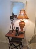 Victorian table with barley twist legs. Candlestick telephone, vintage mirror and decor items.