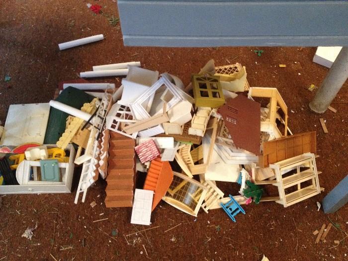 Bits and pieces of doll houses - stairs, windows, door, bottom pieces