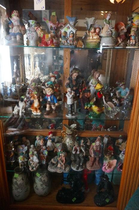 Figurines and knick knacks.  Note the two Japanese vases on bottom left.