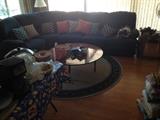round coffee table, blue couch