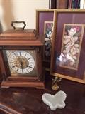 Clocks and floral pictures