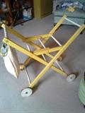 Vintage clothing cart with clothespins 