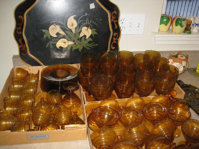 Amber glassware set and a few salads, large platter in background