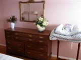 Wood dresser, ornate mirror, King spread with 2 pillow shams