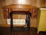 Wood vintage sewing cabinet with iron stand.  Cabinet only