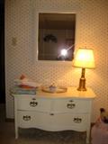 Serpentine front chest of drawers, brass lamp etc