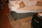 9' sofa, green with white slip covers filled with down.