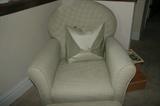 Chair is a soft green checker pattern