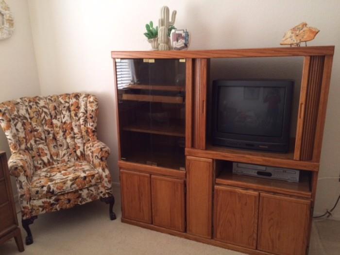 Brown wingback and entertainment center