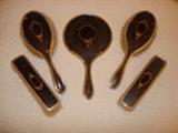 Tortoise shell (?) dresser set.  Very pretty with sterling inlay.
