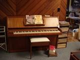 Challens upright with stool.  Nice sound!  Have quote for local delivery.  Sheet music to the right of the piano.