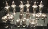Group of weighted Sterling salt and peppers, various sizes and styles 