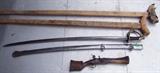 Pair of C/1860 Civil War handmade wood crutches w/partial Horse Hide covering ~ Model 1840 US Calvary Saber w/scabbard "Wrist Breaker type", cleaned ~ C/1930's reproduction handmade Blunderbuss flint lock w/inlay 