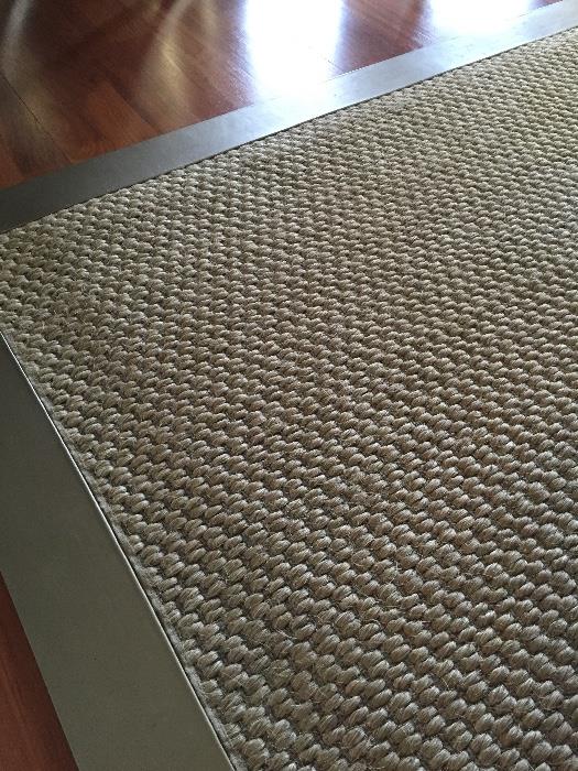 Silver Leather-Edged Area Rug in Dining Room
