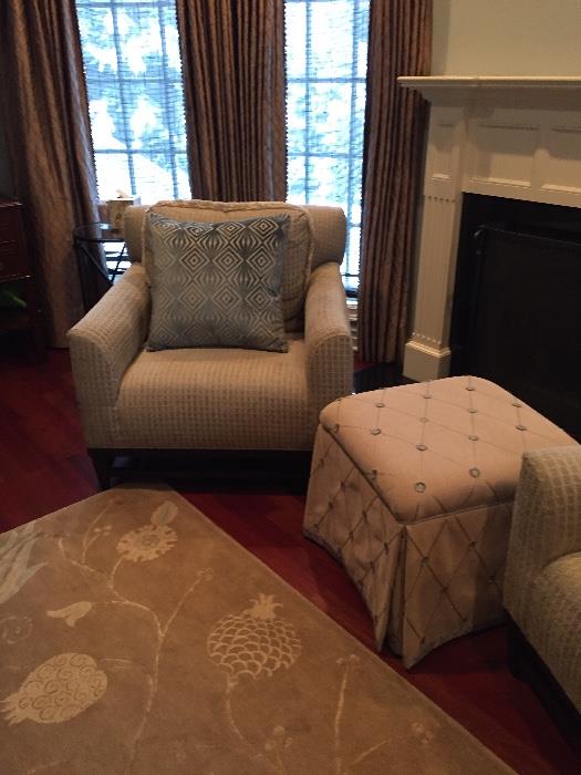 second chair and the ottoman - area rug also available - located in the Master Bedroom