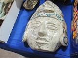Carved rock native mask