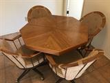 Kitchen table with leaf and 4 swivel rocker chairs