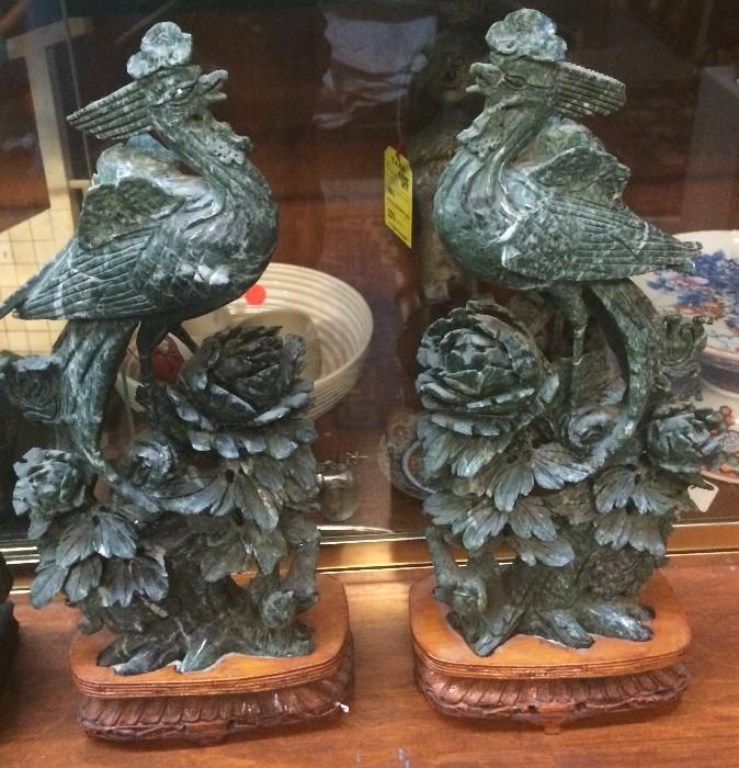 Pair of large serpentine phoenix bird carvings