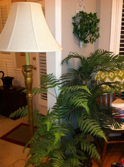 Floor lamps, faux plants.