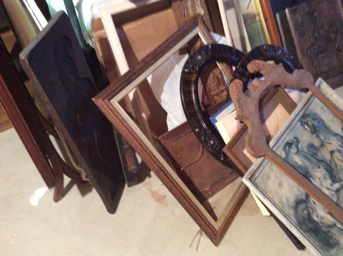 Many antique and newer picture frames