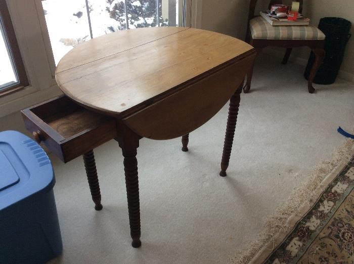 Antique drop leaf table with drawer