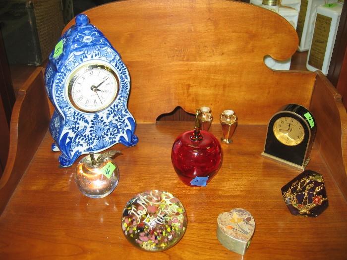 Clocks and paperweights