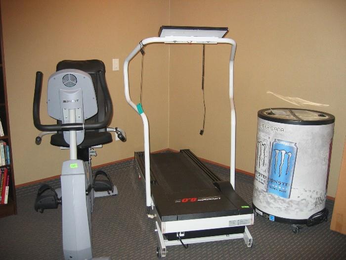 Recumbent bike with various electronic programs and treadmill just added to floor.  Round cooler, on wheels, plug in for 12 hours; stays cold for 12 hours unplugged.  Monster wrap can be removed.