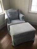 Linen covered easy chair with ottomon