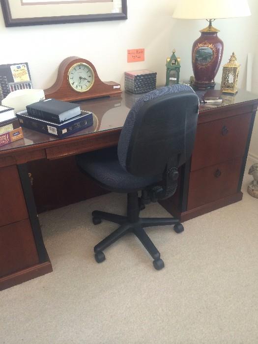Desk; Sunbeam quartz mantel clock; office chair