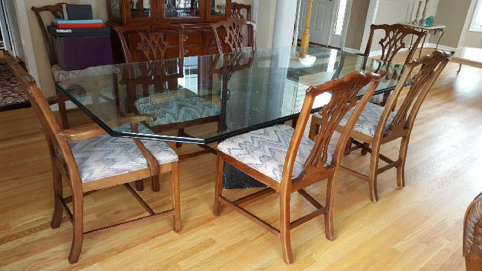 Glass top table with Lucite base - $150   6 dining room chairs - $180