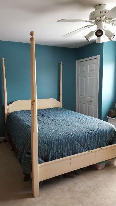 Pine poster bed - $150  Queen