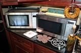 2 stainless microwaves