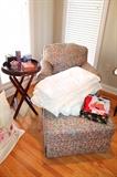 Upholstered armchair and ottoman, folding tray table, linens