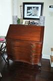 Vintage claw-and-ball drop-front desk with serpentine front