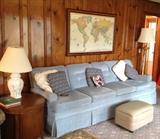 Matching ginger jar lamps, extra long sofa, magnetic world map and ottoman with storage on casters