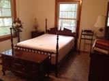 Full size poster spool bed with temperpedic mattress