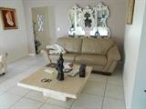 Southern Lifestyles Taupe Leather Sofa, Large mirror, Italian Marble Coffee table 