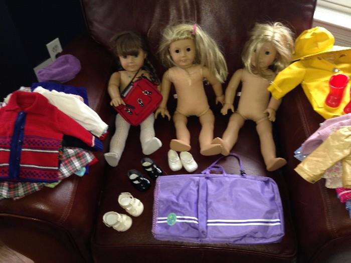 three American Girl dolls and accessories