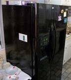 Newer Frigidaire Gallery Side-by-Side Refrigerator / Freezer with Ice / Water in the Door and Electronic Controls