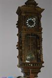 Gazzo Clock stikes every 15 min. Pillers carved ending with Angel Cornis'
With brass.