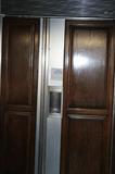 Sub Zero with wood on doors.